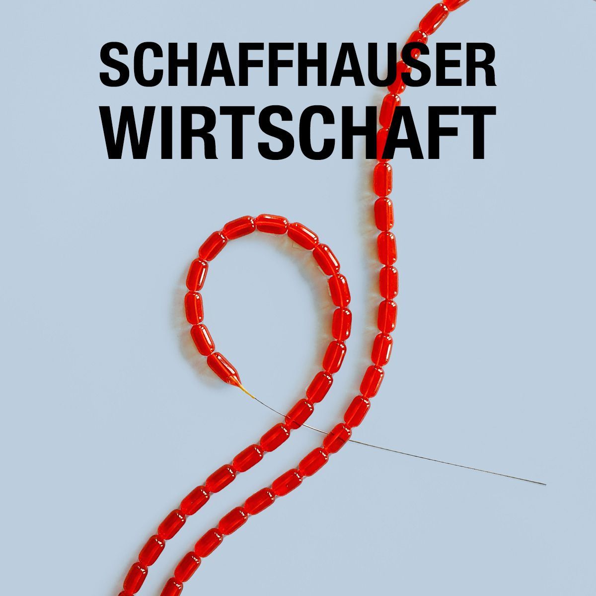 Eine Kette aus roten Perlen mit dem Schriftzug Schaffhauser Wirtschaft darüber